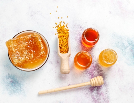 various-kinds-honey-glass-jars-honeycomb-pollen