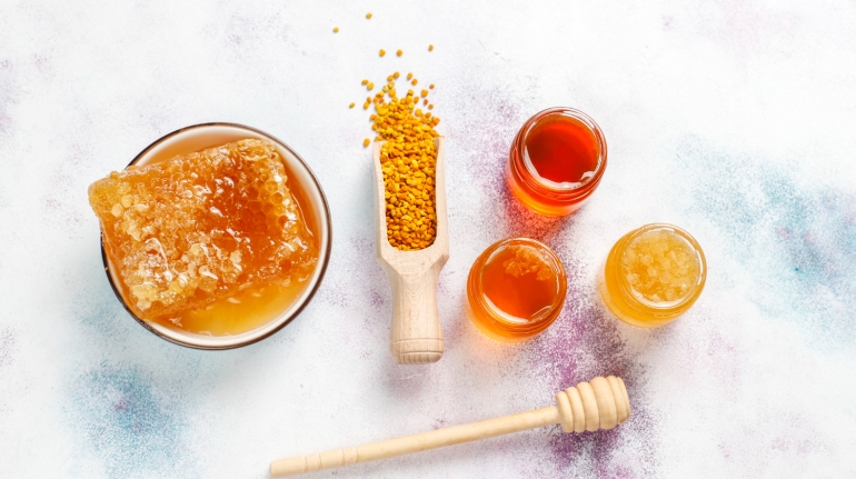 various-kinds-honey-glass-jars-honeycomb-pollen