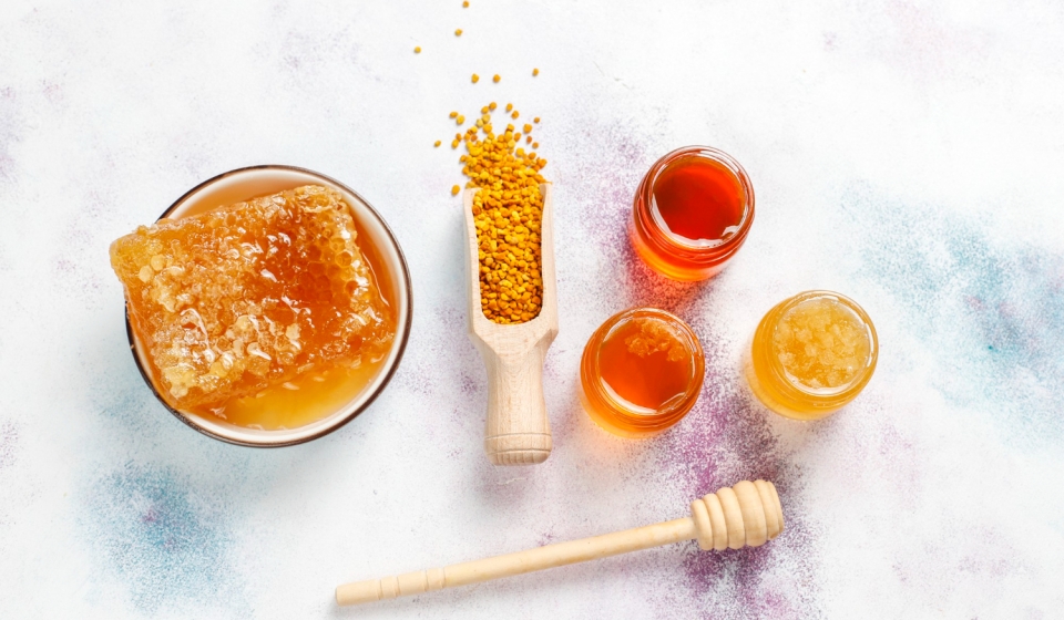 various-kinds-honey-glass-jars-honeycomb-pollen